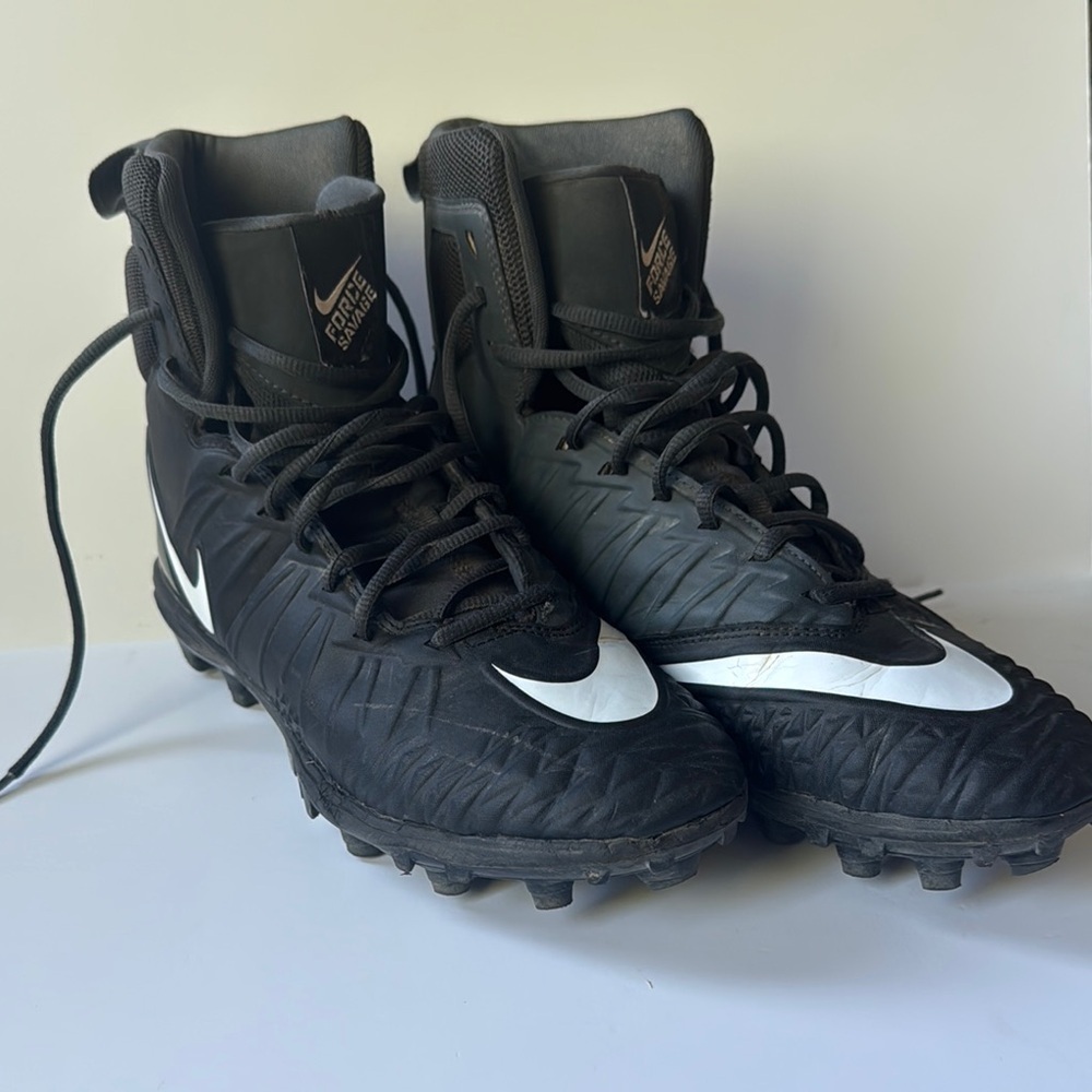 Nike Black and White Football Cleats. High top. Size 9.5